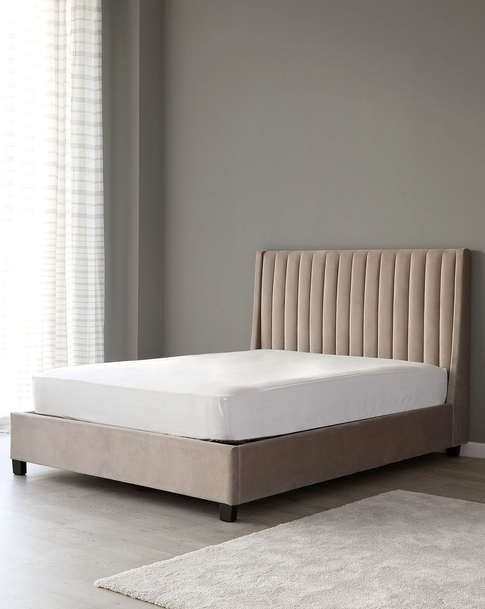 Amalfi Bed available in velvet, fabric, and leather with a stylish headboard