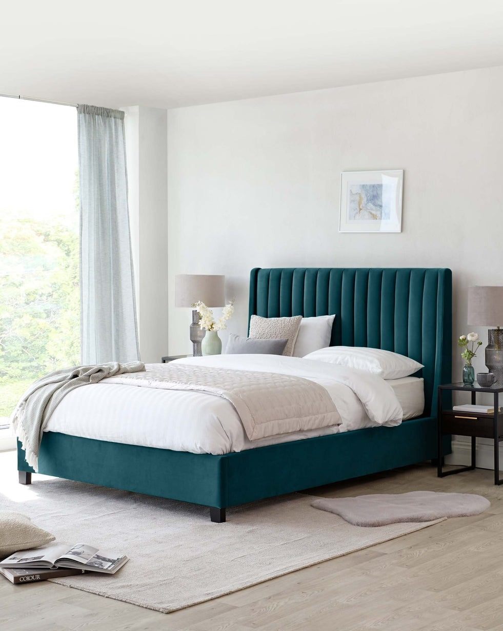 Amalfi Bed available in velvet, fabric, and leather with a stylish headboard